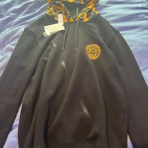 Black Versace hoodie.